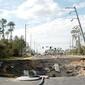 capt.wxs10312182342.a_sinkhole_wxs103